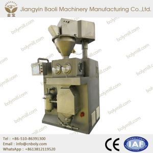 Stroj na granuláciu suchých práškov